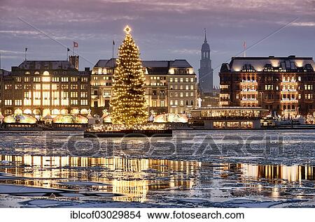 Picture - "Binnenalster or Inner Alster Lake with a Christmas tree and Jungfernstieg, new town, Hamburg, Hamburg, Germany, Europe". Fotosearch