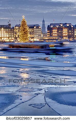 Stock Photo - "Binnenalster or Inner Alster Lake with a Christmas tree and Jungfernstieg, Hamburg Neustadt, Hamburg, Hamburg, Germany, Europe". Fotosearch