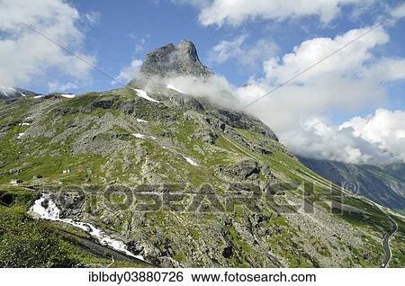 "Bispen Mountain above the Trollstigen Road with the Stigfossen waterfall, near Andalsnes, More og Romsdal, Western Norway, Norway, Europe" View Large Photo Image Stock Photograph - "Bispen Mountain above the Trollstigen Road with the Stigfossen waterfall, near Andalsnes, More og Romsdal, Western Norway, Norway, Europe". Fotosearch