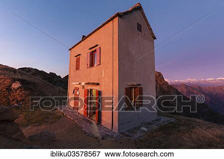 Stock Photo - "Bivacco Bocchetta di Campo mountain hut in the morning light, Val Grande National Park, Verbano-Cusio-Ossola province, Piedmont, Italy, Europe". Fotosearch