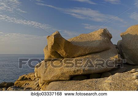"Bizarre granite rocks at the coast of the mediterranean sea in Calvi below a blue sky with some clouds. Calvi is in the department Haute-Corse, France on the mediterranean island of Corsica, Calvi, Corsica, France, Europe" View Large Photo Image Stock Photo - "Bizarre granite rocks at the coast of the mediterranean sea in Calvi below a blue sky with some clouds. Calvi is in the department Haute-Corse, France on the mediterranean island of Corsica, Calvi, Corsica, France, Europe". Fotosearch