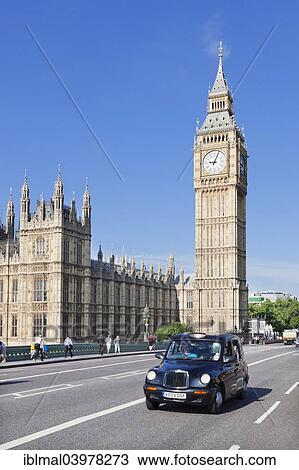 Stock Image - "Black cab on Westminster Bridge with Big Ben and the Houses of Parliament, London, England, United Kingdom, Europe". Fotosearch