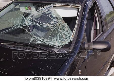 Picture - "Black compact car with an accident-damaged windshield, Hungary, Europe". Fotosearch