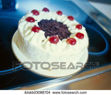 Black Forest cherry cake on a stove View Large Photo Image Picture - Black Forest cherry cake on a stove. Fotosearch