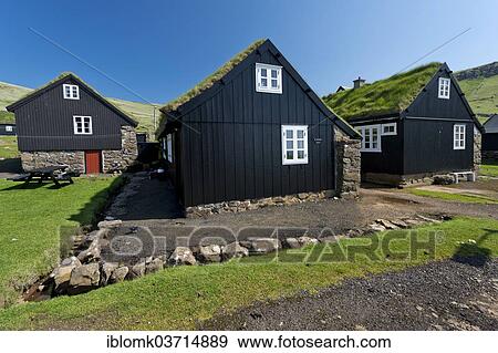 "Black houses, tarred, with white window frames, traditional Faroese style, wood on a stone base with a sod roof, Mykines, Mykines, Faroe Islands, Denmark, Europe" View Large Photo Image Stock Photo - "Black houses, tarred, with white window frames, traditional Faroese style, wood on a stone base with a sod roof, Mykines, Mykines, Faroe Islands, Denmark, Europe". Fotosearch