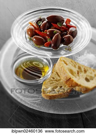 Stock Photograph - Black olives and balsamic dip. Fotosearch