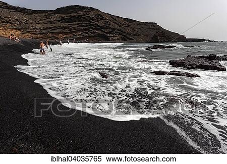 "Black pebble beach near El Golfo, people bathing in the sea, volcanic crater, Lanzarote, Canary Islands, Spain, Europe" View Large Photo Image Stock Photography - "Black pebble beach near El Golfo, people bathing in the sea, volcanic crater, Lanzarote, Canary Islands, Spain, Europe". Fotosearch