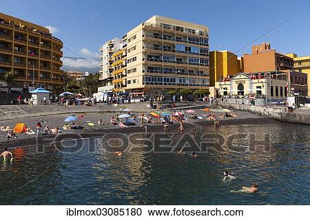 "Black sandy beach at the fishing port, Punta Brava, Puerto de la Cruz, Tenerife, Canary Islands, Spain, Europe" View Large Photo Image Stock Image - "Black sandy beach at the fishing port, Punta Brava, Puerto de la Cruz, Tenerife, Canary Islands, Spain, Europe". Fotosearch