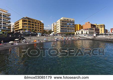 "Black sandy beach at the fishing port, Punta Brava, Puerto de la Cruz, Tenerife, Canary Islands, Spain, Europe" View Large Photo Image Stock Photo - "Black sandy beach at the fishing port, Punta Brava, Puerto de la Cruz, Tenerife, Canary Islands, Spain, Europe". Fotosearch