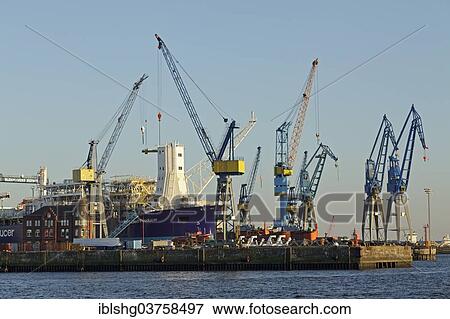 "Blohm and Voss Shipyards with gantry cranes, Port of Hamburg, Hamburg, Hamburg, Germany, Europe" View Large Photo Image Stock Photo - "Blohm and Voss Shipyards with gantry cranes, Port of Hamburg, Hamburg, Hamburg, Germany, Europe". Fotosearch
