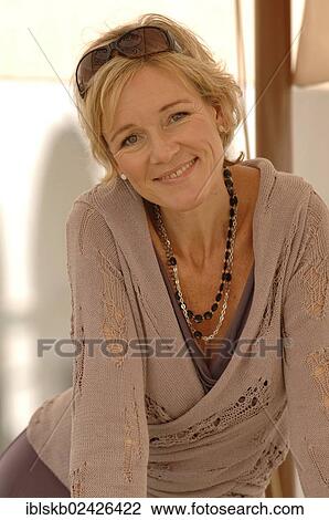 "Blonde woman, 40-50 years, portrait" View Large Photo Image Stock Image - "Blonde woman, 40-50 years, portrait". Fotosearch