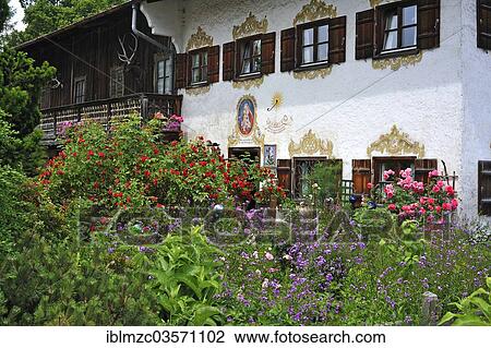 "Blooming, colourful cottage garden in front of a farmhouse with Lueftlmalerei murals from 1936, Durnbach, Upper Bavaria, Bavaria, Germany, Europe" View Large Photo Image Stock Image - "Blooming, colourful cottage garden in front of a farmhouse with Lueftlmalerei murals from 1936, Durnbach, Upper Bavaria, Bavaria, Germany, Europe". Fotosearch