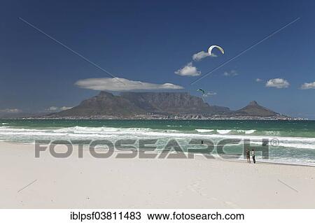 Stock Image - "Bloubergstrand beach, looking towards Cape Town and Table Mountain, Western Cape, South Africa, Africa". Fotosearch