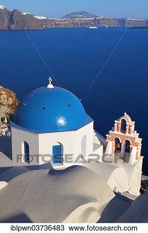 Stock Image - "Blue-domed Byzantine Orthodox church, Oia, Santorini, Cyclades, Greece, Europe". Fotosearch
