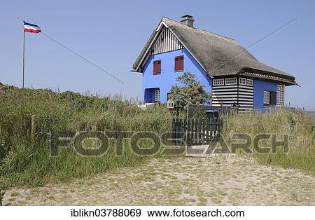 "Blue holiday home, Graswarder Peninsula, Heiligenhafen, Schleswig-Holstein, Germany, Europe" View Large Photo Image Stock Photo - "Blue holiday home, Graswarder Peninsula, Heiligenhafen, Schleswig-Holstein, Germany, Europe". Fotosearch