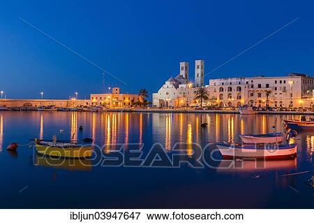 "Blue Hour, dusk, fishing boats, harbour, historic centre, with the Romanesque Duomo Vecchio, old cathedral, San Corrado, Molfetta, Bari Province, Apulia, Italy, Europe" View Large Photo Image Stock Photo - "Blue Hour, dusk, fishing boats, harbour, historic centre, with the Romanesque Duomo Vecchio, old cathedral, San Corrado, Molfetta, Bari Province, Apulia, Italy, Europe". Fotosearch