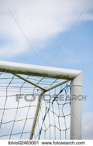 Blue sky and detail of football goal View Large Photo Image Stock Image - Blue sky and detail of football goal. Fotosearch