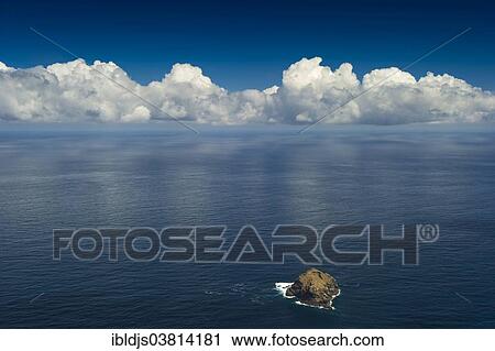 "Blue sky with clouds, a small island and the sea, Tenerife, Canary Islands, Spain, Europe" View Large Photo Image Stock Image - "Blue sky with clouds, a small island and the sea, Tenerife, Canary Islands, Spain, Europe". Fotosearch