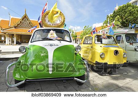 Stock Photo - "BMW Isetta, vintage car exhibition, Wat Ratchanatda at the back, Bangkok, Thailand, Asia". Fotosearch