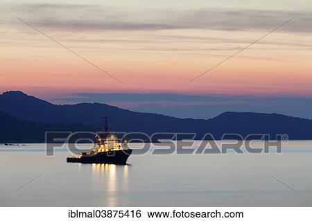 "Boat at sunset on the Gulf of Saint-Florent, Corsica, France, Europe" View Large Photo Image Stock Photograph - "Boat at sunset on the Gulf of Saint-Florent, Corsica, France, Europe". Fotosearch