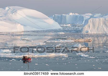 "Boat between icebergs, Ilulissat Icefjord, UNESCO World Heritage Site, Disko Bay, West Greenland, Greenland, North America" View Large Photo Image Stock Photo - "Boat between icebergs, Ilulissat Icefjord, UNESCO World Heritage Site, Disko Bay, West Greenland, Greenland, North America". Fotosearch