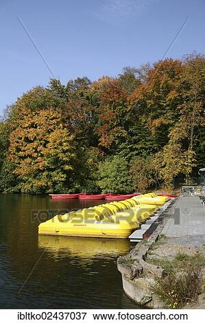 Stock Photo - "Boat hire, autumn in the recreation area at Decksteiner Weiher lake, Cologne, Nordrhein-Westfalen, Germany, Europe". Fotosearch