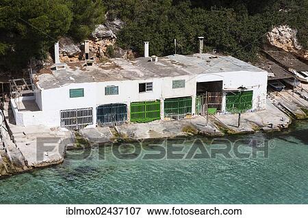 Stock Photo - "Boat house in the bay of Cala Pi, South Coast, Mallorca, Majorca, Balearic Islands, Mediterranean Sea, Spain, Europe". Fotosearch