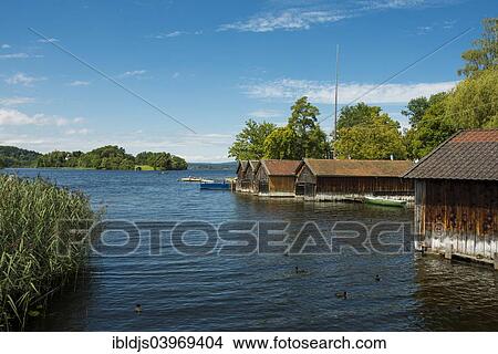 Picture - "Boat houses at Staffelsee Lake, Seehausen, Upper Bavaria, Bavaria, Germany, Europe". Fotosearch