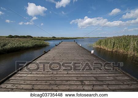 "Boat jetty on Ringkobing Fjord, Henne Strand, Jutland, Denmark, Europe" View Large Photo Image Stock Photo - "Boat jetty on Ringkobing Fjord, Henne Strand, Jutland, Denmark, Europe". Fotosearch