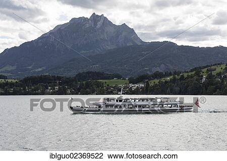"Boat on Lake Lucerne in front of Pilatus Mountain, seen from Meggen, Lucerne, Switzerland, Europe" View Large Photo Image Stock Image - "Boat on Lake Lucerne in front of Pilatus Mountain, seen from Meggen, Lucerne, Switzerland, Europe". Fotosearch