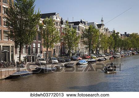 "Boat on the canal, Amsterdam, North Holland province, Netherlands" View Large Photo Image Stock Image - "Boat on the canal, Amsterdam, North Holland province, Netherlands". Fotosearch