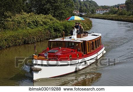 "Boat on the Canal des Vosges, formerly Canal de l'Est, Fontenoy-le-Chateau, Epinal, Lorraine, Departement Vosges, France, Europe" View Large Photo Image Stock Photo - "Boat on the Canal des Vosges, formerly Canal de l'Est, Fontenoy-le-Chateau, Epinal, Lorraine, Departement Vosges, France, Europe". Fotosearch