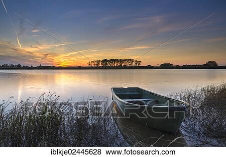 "Boat on the riverside, Weser river, Wurthfleth, Sandstedt, Lower Saxony, Germany, Europe" View Large Photo Image Stock Photo - "Boat on the riverside, Weser river, Wurthfleth, Sandstedt, Lower Saxony, Germany, Europe". Fotosearch