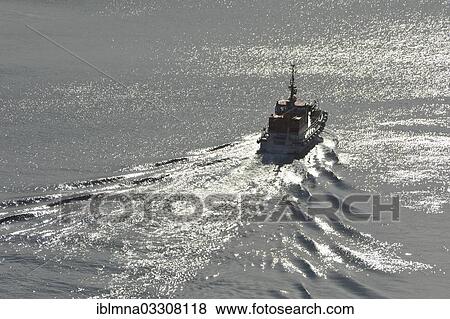"Boat on wavy water, near Honningsvag, Finnmark County, Norway, Europe" View Large Photo Image Stock Photo - "Boat on wavy water, near Honningsvag, Finnmark County, Norway, Europe". Fotosearch