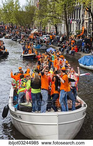 "Boat parade on Queen's Day, Prinsengracht canal, Amsterdam, province of North Holland, The Netherlands, Europe" View Large Photo Image Stock Photography - "Boat parade on Queen's Day, Prinsengracht canal, Amsterdam, province of North Holland, The Netherlands, Europe". Fotosearch