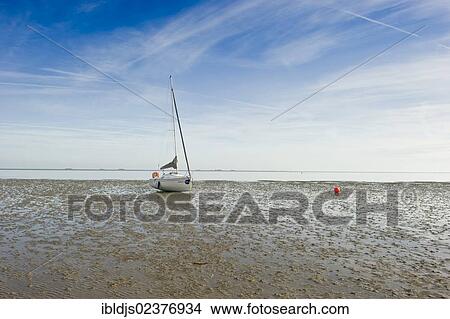 "Boat, Wadden Sea near Wyk, Foehr island, North Frisia, Schleswig-Holstein, Germany, Europe" View Large Photo Image Picture - "Boat, Wadden Sea near Wyk, Foehr island, North Frisia, Schleswig-Holstein, Germany, Europe". Fotosearch