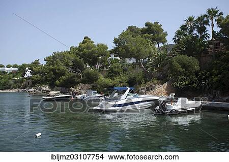 Picture - "Boat wharf, Cap d'es Pinar, Mallorca, Majorca, Balearic Islands, Spain, Europe". Fotosearch