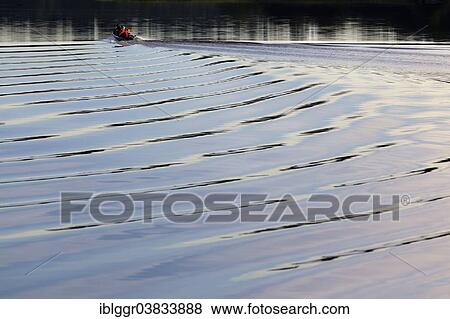 Stock Photo - "Boat with stern waves on Lake Asnen, Smaland, Sweden, Europe". Fotosearch