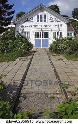 "Boathouse of the Blankenese sailing club, BSC, Blankenese quarter, Strandweg street on the Elbe river, Hamburg-Blankenese, Altona district, suburb on the Elbe river, Hamburg, Germany, Europe, PublicGround, Europe" View Large Photo Image Stock Photography - "Boathouse of the Blankenese sailing club, BSC, Blankenese quarter, Strandweg street on the Elbe river, Hamburg-Blankenese, Altona district, suburb on the Elbe river, Hamburg, Germany, Europe, PublicGround, Europe". Fotosearch