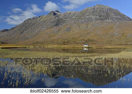 "Boathouse reflected in the lake in front of Mt. Liathach, Glen Torridon, Beinn Eighe National Nature Reserve, SNH, Kinlochewe, Scottish Highlands, Western Ross, Scotland, United Kingdom, Europe" View Large Photo Image Stock Photography - "Boathouse reflected in the lake in front of Mt. Liathach, Glen Torridon, Beinn Eighe National Nature Reserve, SNH, Kinlochewe, Scottish Highlands, Western Ross, Scotland, United Kingdom, Europe". Fotosearch