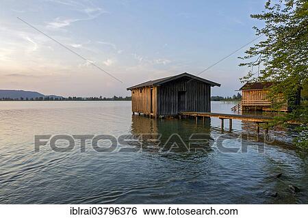 "Boathouses on Lake Kochel in the evening light, Kochel am See, Upper Bavaria, Bavaria, Germany, Europe" View Large Photo Image Stock Photograph - "Boathouses on Lake Kochel in the evening light, Kochel am See, Upper Bavaria, Bavaria, Germany, Europe". Fotosearch