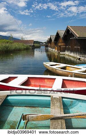 Stock Image - "Boats and boat houses on Staffelsee Lake, Seehausen, Upper Bavaria, Bavaria, Germany, Europe". Fotosearch