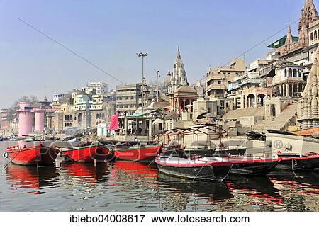 Stock Photo - "Boats and Ghats on the Ganges, Varanasi, Benares, Uttar Pradesh, India, Asia". Fotosearch