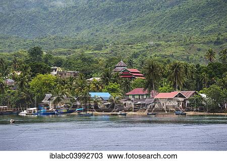 "Boats and village after tropical rainfall, Tomea Island, Sulawesi, Indonesia, Asia" View Large Photo Image Stock Image - "Boats and village after tropical rainfall, Tomea Island, Sulawesi, Indonesia, Asia". Fotosearch