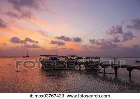 "Boats at a jetty at sunset, Male, North Male Atoll, Maldives, Asia" View Large Photo Image Stock Photo - "Boats at a jetty at sunset, Male, North Male Atoll, Maldives, Asia". Fotosearch