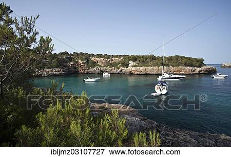 "Boats at anchor in the bay, Cala Sa Nau, Mallorca, Majorca, Balearic Islands, Spain, Europe" View Large Photo Image Stock Photo - "Boats at anchor in the bay, Cala Sa Nau, Mallorca, Majorca, Balearic Islands, Spain, Europe". Fotosearch