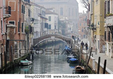 Stock Photo - "Boats, bridge, houses along a canal, Rio Santa Caterina, Fondamenta Zen, Cannaregio, Venice, Venezia, Veneto, Italy, Europe". Fotosearch