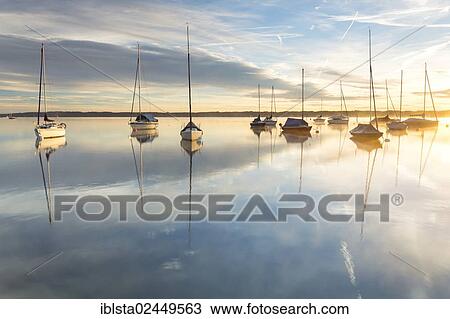 "Boats, early morning mood on Lake Starnberg, Bavaria, Germany, Europe, PublicGround, Europe" View Large Photo Image Stock Image - "Boats, early morning mood on Lake Starnberg, Bavaria, Germany, Europe, PublicGround, Europe". Fotosearch