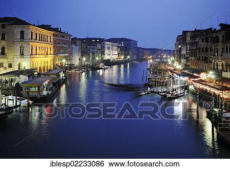"Boats, gondolas on the Grand Canal, Canal Grande, from Rialto Bridge, Palazzo Dolfin Manin, Palazzo Barbarigo, at night, Venice, Venezia, Veneto, Italy, Europe" View Large Photo Image Stock Photograph - "Boats, gondolas on the Grand Canal, Canal Grande, from Rialto Bridge, Palazzo Dolfin Manin, Palazzo Barbarigo, at night, Venice, Venezia, Veneto, Italy, Europe". Fotosearch