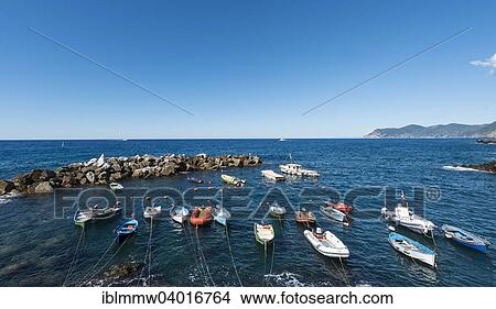 "Boats in the harbor in front of harbour protection wall, Riomaggiore, Cinque Terre, La Spezia, Cinque Terre, Liguria, Italy, Europe" View Large Photo Image Picture - "Boats in the harbor in front of harbour protection wall, Riomaggiore, Cinque Terre, La Spezia, Cinque Terre, Liguria, Italy, Europe". Fotosearch